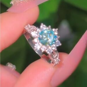 1 carat moissanite ring - brand new; sterling silver